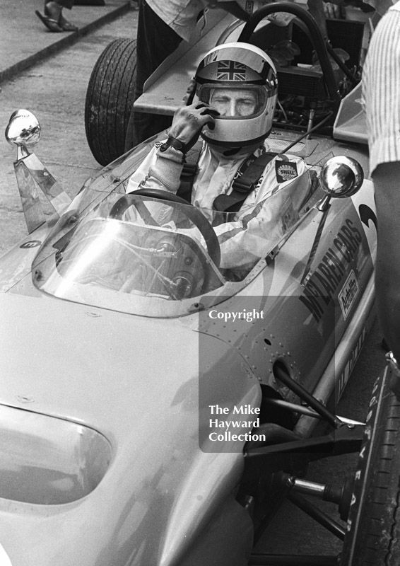 Derek Bell, McLaren Ford Cosworth M9A/1 V8 4WD, Silverstone, 1969 British Grand Prix.
