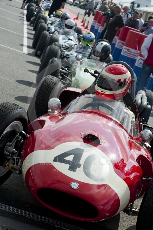 1959 Cooper Maserati of Steve Russell at the head of the queue in the paddock before the HGPCA pre-66 Grand Prix cars event at Silverstone Classic 2010