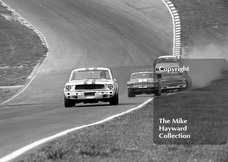 Jack Oliver, Ford Mustang, leads out of Paddock Bend, British Touring Car Championship Race, Guards International meeting, Brands Hatch 1967.
