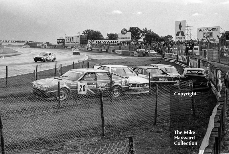 A very expensive car park at Woodcote Corner with&nbsp;Marc Duez's Rover Vitesse,&nbsp;Barrie&nbsp;Williams' BMW 635, Chuck Nicholson's Jaguar XJS, Terry Drury's Alfa Romeo and Rob Hall's MG Metro Turbo, Istel Tourist Trophy, European Touring Car Championship, Silverstone, 1984
