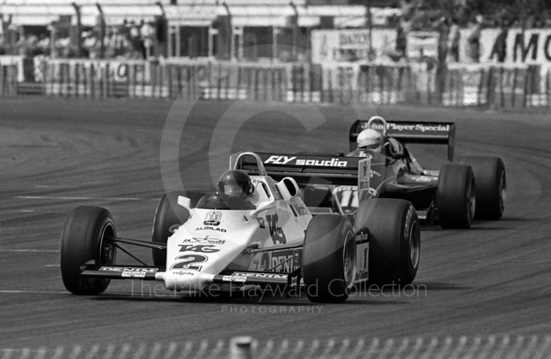 Jacques Laffite, Saudia Williams FW08C and Elio de Angelis, JPS Lotus 94T, British Grand Prix, Silverstone, 1983

