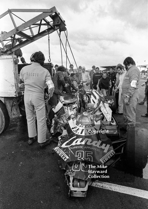 Marshalls retrieve the wreckage of Brian Henton's Toleman TG181, Silverstone, British Grand Prix 1981.
