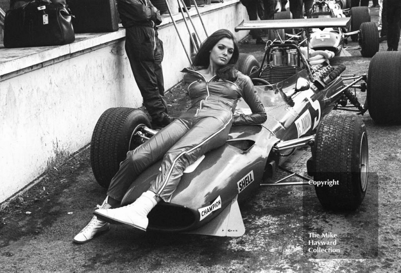 A model poses on the Ferrari 312 V12 of Chris Amon, Brands Hatch, 1968 British Grand Prix.
