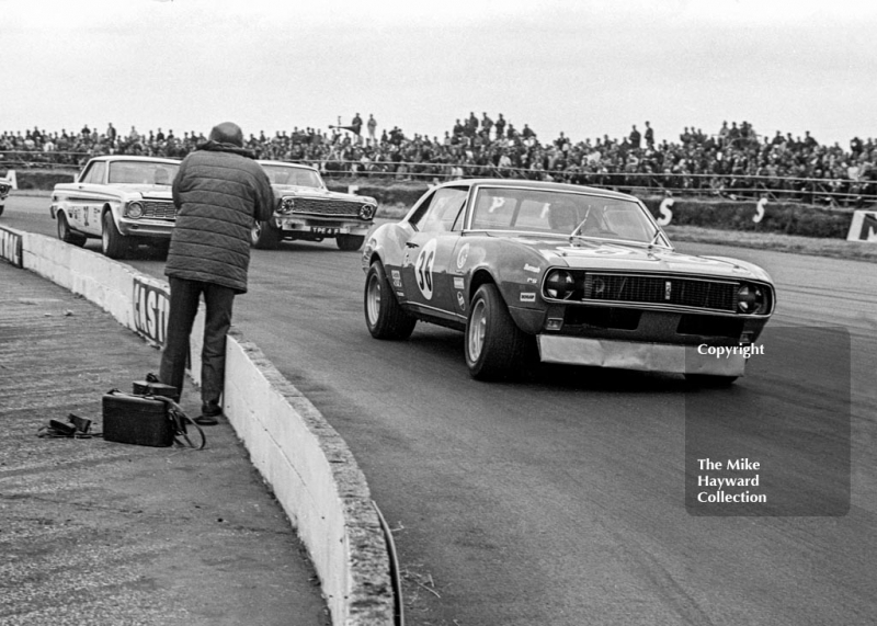 Roy Pierpoint, WJ Shaw Chevrolet Camaro, and Terry Sanger, Ford Falcon, Silverstone, British Grand Prix meeting 1969.
