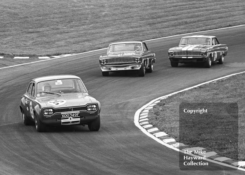 Frank Gardner, Alan Mann Ford Escort, reg no XOO 349F, followed by Hubert Hahne, Ford Falcon Sprint, and Brian Muir, Ford Falcon Sprint, Brands Hatch, Grand Prix meeting 1968.
