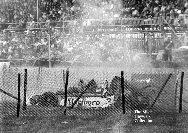 Eddie Jordan, March 793 Toyota, explores the catch fencing on lap 19 during the Formula 3 race, Silverstone, British Grand Prix 1979.
