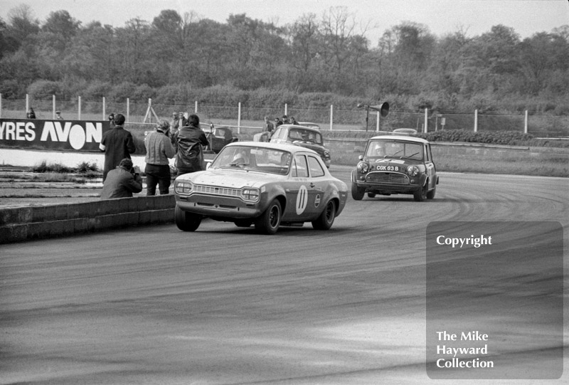 Lawrie Hickman, Ford Escort, Desmond Gibb, Mini Cooper (CGK 63B), Silverstone, 1969 Martini Trophy meeting.
