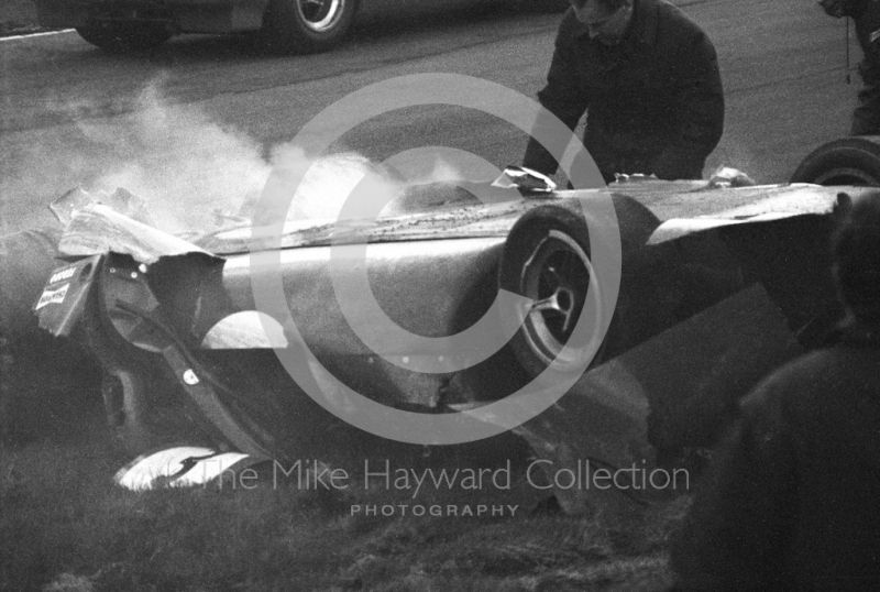 Marshalls with the wreckage of Jo Bonnier's Lola T70 which somersaulted at Bottom Bend, Brands Hatch, BOAC 500 1969.
