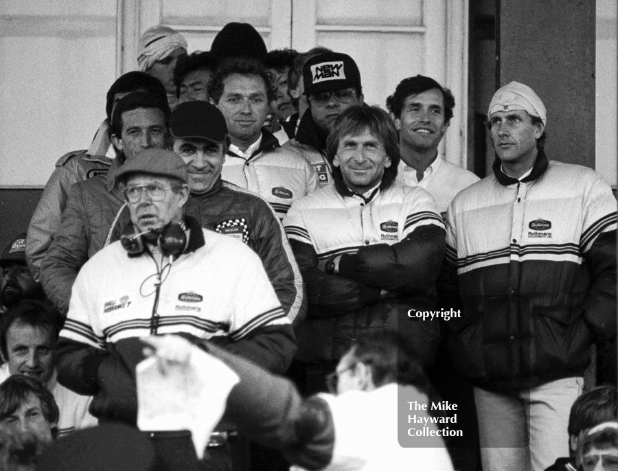 The Rothmans Porsche team line up before the start - faces include Jochen Mass, Derek Bell and&nbsp;Jacky Ickx. World Endurance Championship, 1985&nbsp;Grand Prix International 1000km meeting, Silverstone.
