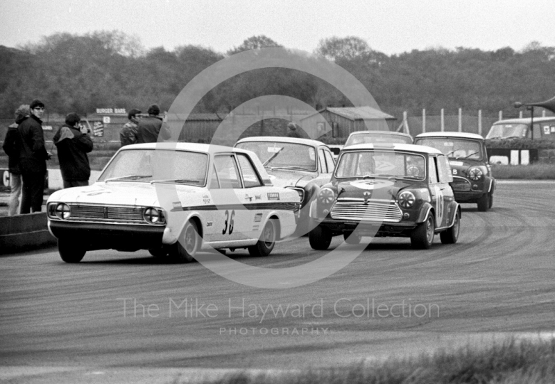 P Jackson, Ford Lotus Cortina, and John Handley, British Leyland Mini Cooper S, Silverstone Martini International Trophy meeting 1969.
