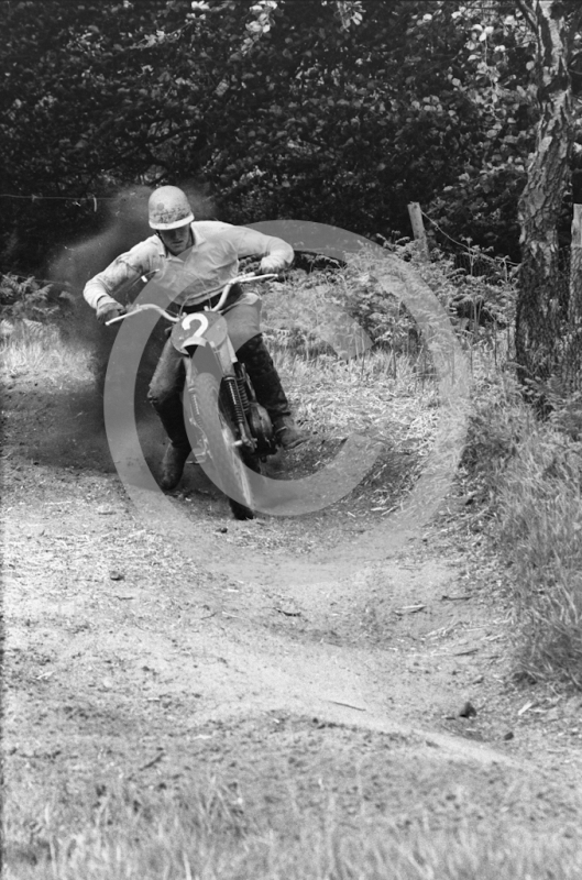 A 250cc rider pressing on, 1966 motocross meeting, Hawkstone.