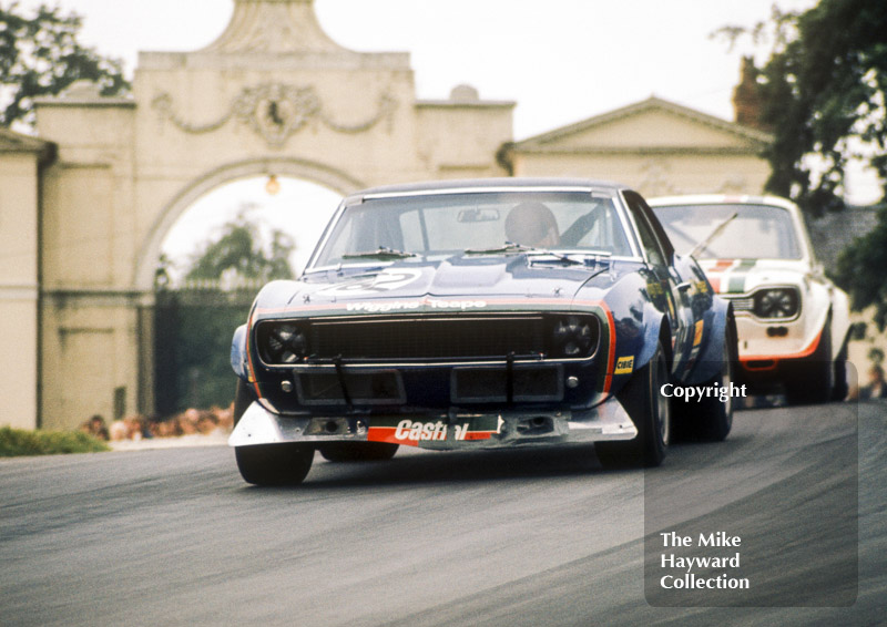 Brian Muir, Wiggins Teape Chevrolet Camaro, followed by John Fitzpatrick in a Broadspeed Ford Escort RS1600, Hepolite Glacier Trophy race, Oulton Park Gold Cup meeting 1971.
