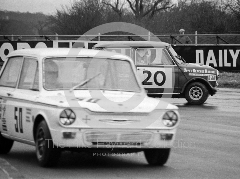 J Nightingale, Hillman Imp, with Martin Ridehalgh, Mini 7 Club Mini Cooper S, taking a strange line at Copse Corner, Silverstone International Trophy meeting 1969.
