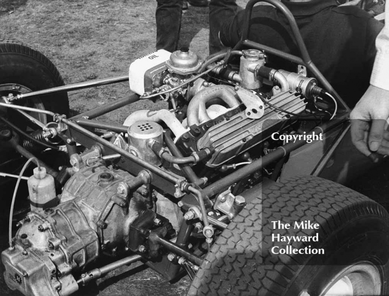 Cosworth engine in the pits, Oulton Park Gold Cup meeting, 1964.
