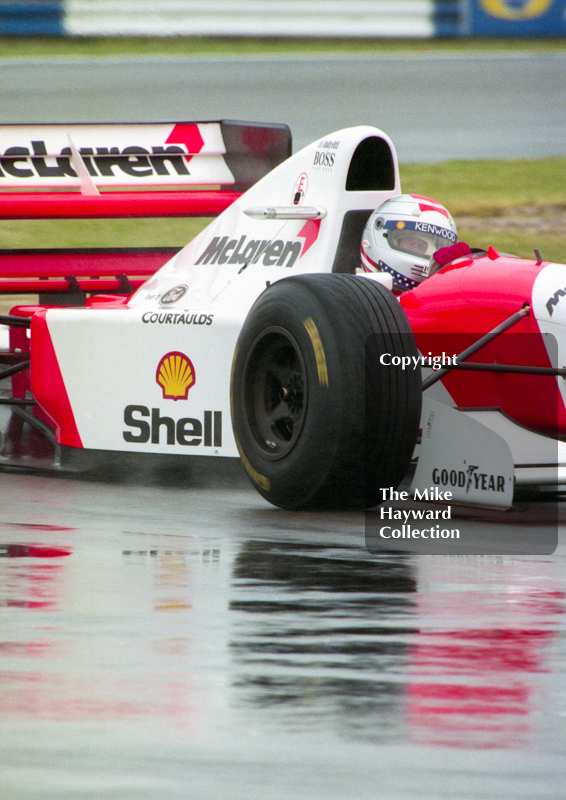 Michael Andretti, McLaren MP4-8, seen during wet qualifying at Silverstone for the 1993 British Grand Prix.
