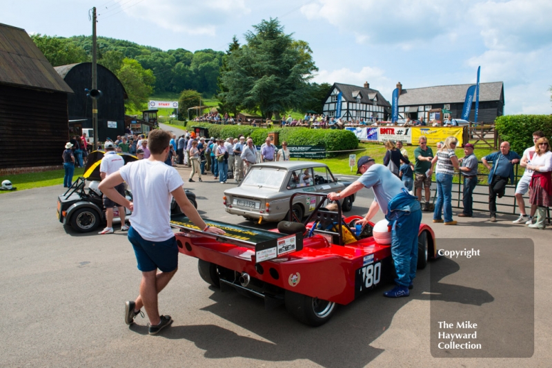 Cars waiting in the paddock at Shelsley Walsh Hill Climb, June 1st 2014.