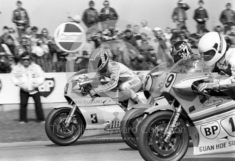  Randy Mamola, 500cc Suzuki, Barry Sheene, Yamaha, and Stu Avant, Suzuki, leave the grid at the John Player International Meeting, Donington Park, 1982.