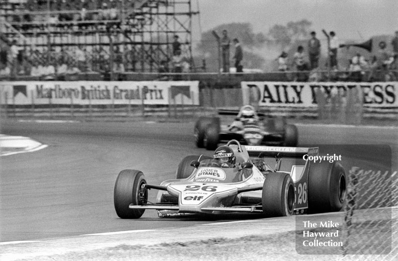 Jacques Laffite, Ligier JS11, Keke Rosberg, Wolf WR7, Silverstone, 1979 British Grand Prix.
