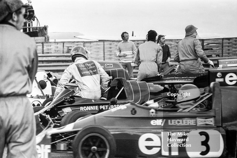 Ronnie Peterson gets out of his Project 3 March 752 BMW after the chicane accident as Michel Leclere threads through the wreckage in his March 752, Wella European Formula Two Championship, Thruxton, 1975
