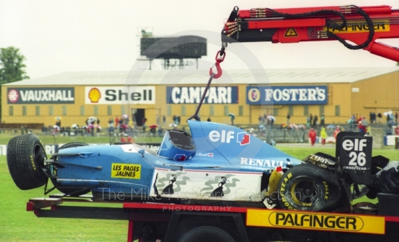 Mark Blundell's Ligier Renault JS39 is taken back to the paddock after crashing during qualifying at Silverstone for the 1993 British Grand Prix.
