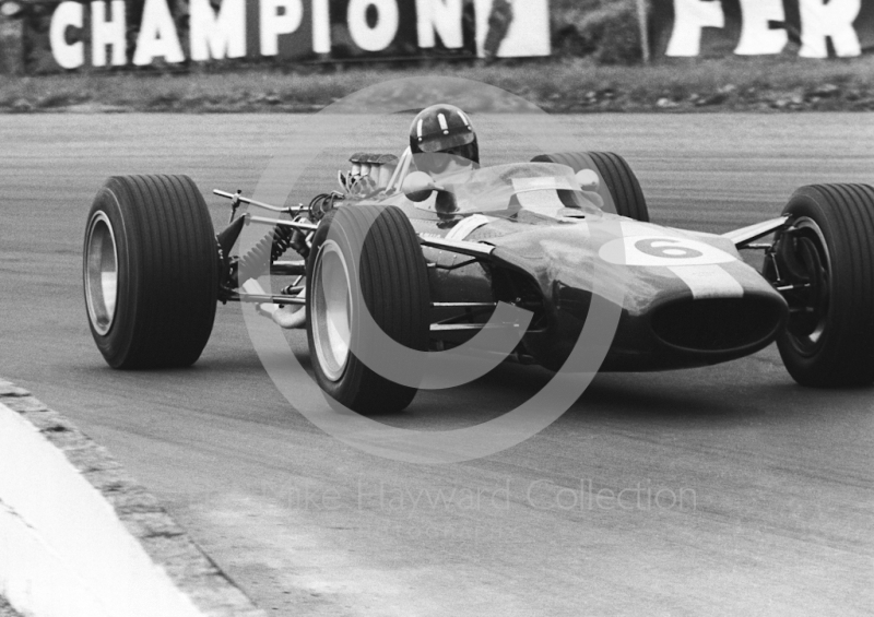 Graham Hill, Lotus Ford Cosworth&nbsp;49, at Copse Corner, Silverstone, British Grand Prix, 1967.
