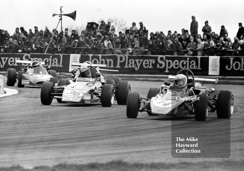 Valentino Musetti, Royale RP11 (14), leads Mike Tyrrell, Ensign LNF3 (36), and Matt Spitzley, March 713M/733 (7), in the GKN Forgings Trophy Race, Silverstone, 1973.
