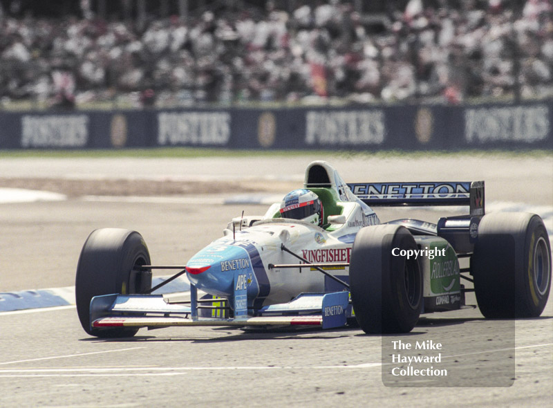 Jean Alesi, Benetton Renault B196 at Woodcote, Silverstone, British Grand Prix 1996.
