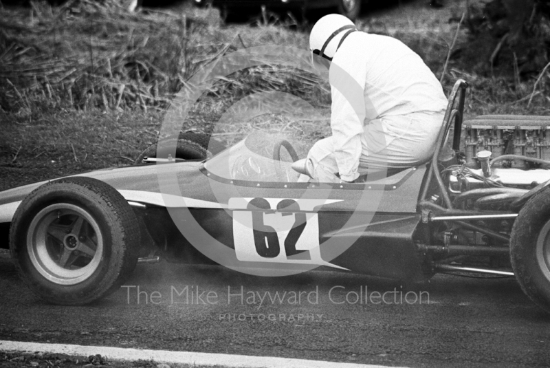 Peter Blankstone climbs from the cockpit of his Brabham Quattro 4WD, Loton Park, April 27, 1969.