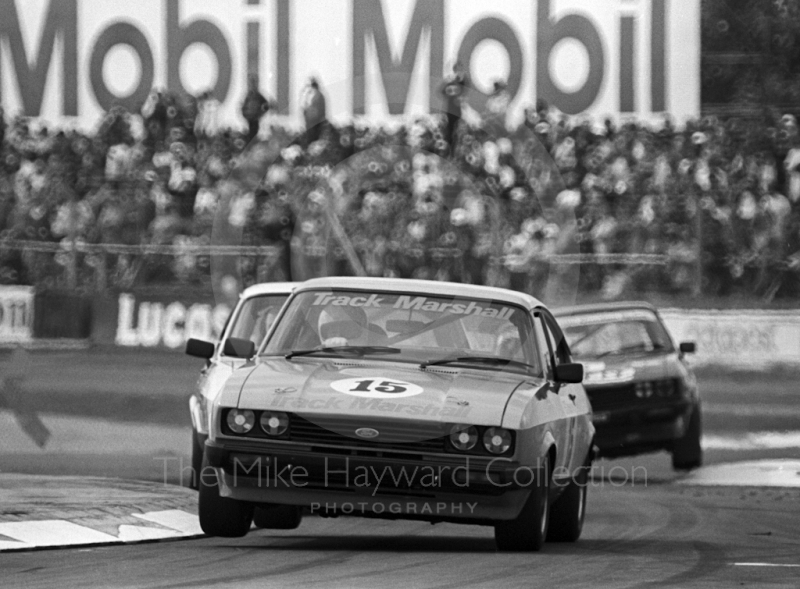 Chuck Nicholson, Track Marshall Ford Capri, British Touring Car Championship round, 1981 British Grand Prix, Silverstone.
