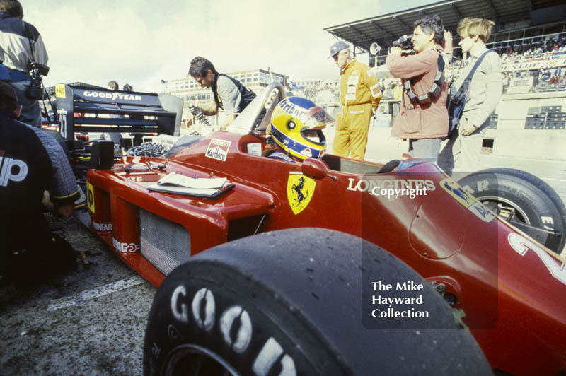 Michele Alboreto, Ferrari 156/85, in the pits at Brands Hatch, 1985 European Grand Prix.
