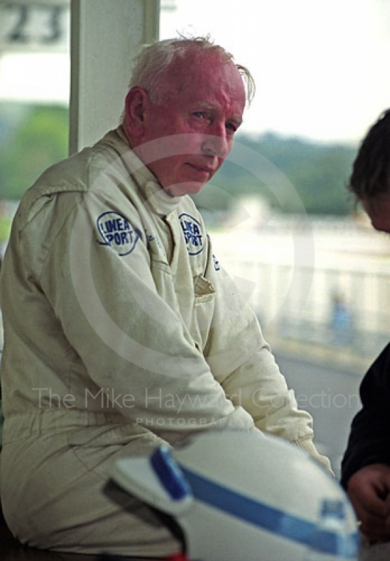 John Surtees takes a break on the pit counter while sharing a Ferrari 250GTO with Willie Green, RAC TT, Goodwood Revival, 1999