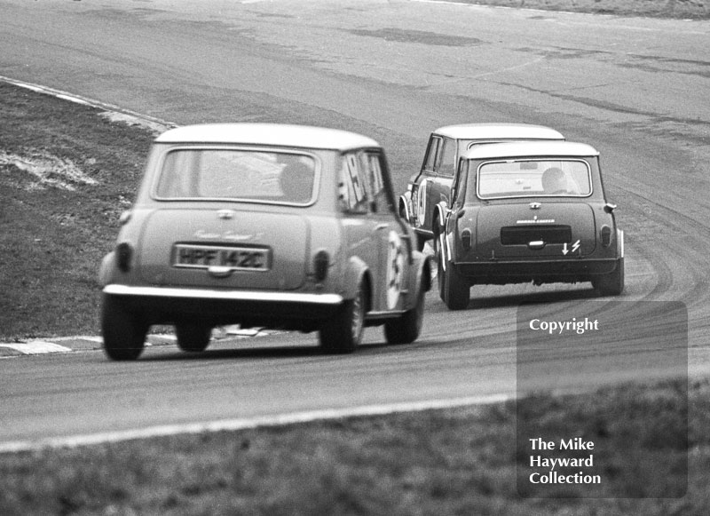 Alec Poole, Equipe Arden Mini Cooper S, leads at Bottom Bend, Brands Hatch, Race of Champions meeting 1969.
