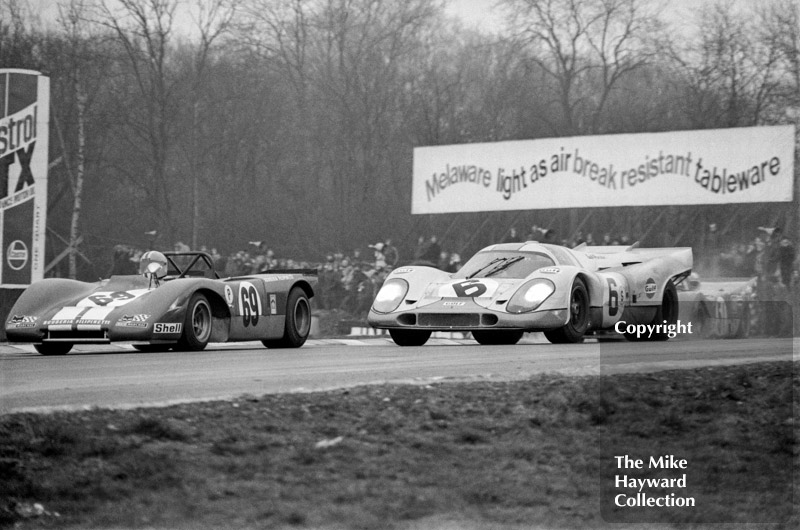 Jo Siffert/Derek Bell, Porsche 917, passing Jo Bonnier/Peter Westbury, Lola T212, at Clearways, Brands Hatch, 1971 BOAC 1000K.
