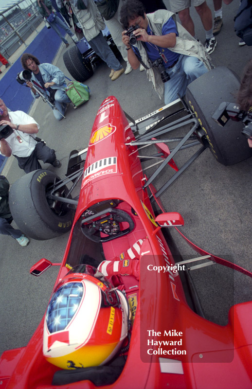 Michael Schumacher, Ferrari F310 in the pit lane, Silverstone, British Grand Prix 1996.
