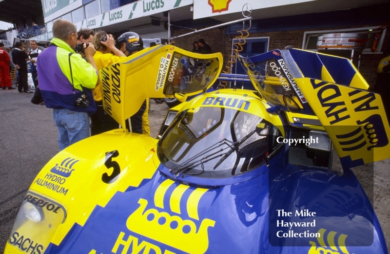 The Brun Porsche 962C of Oscar Larrauri and Harald Huysman in the pits, Wheatcroft Gold Cup, Donington Park, 1989.
