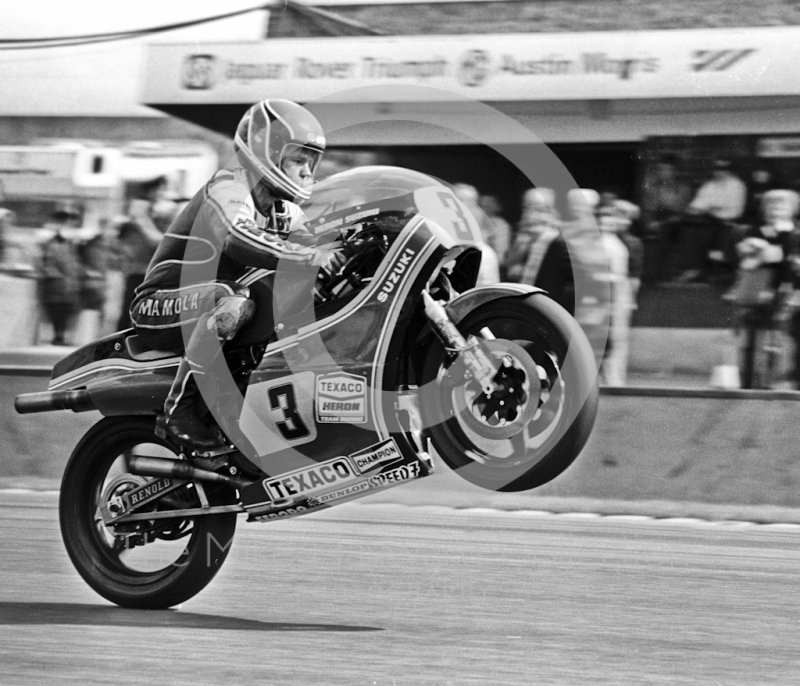  Randy Mamola pops a wheelie on his 500cc Suzuki at the John Player International Meeting, Donington Park, 1982.