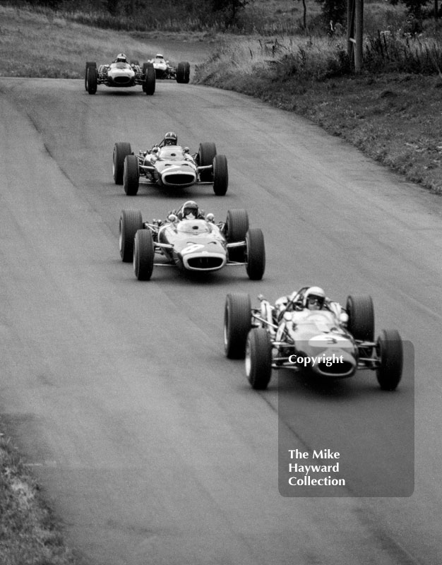 Jack Brabham, Repco Brabham BT19, Jackie Stewart and Graham Hill, BRM P83 H16; Denny Hulme, Repco Brabham BT20&nbsp;and Jim Clark, Lotus Climax 33,&nbsp;Oulton Park, Gold Cup, 1966.
