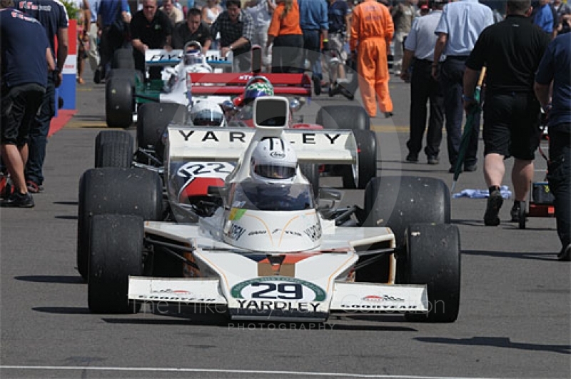 Phil Mauger, 1974 McLaren M23, in the paddock before the Grand Prix Masters race, Silverstone Cassic 2009.