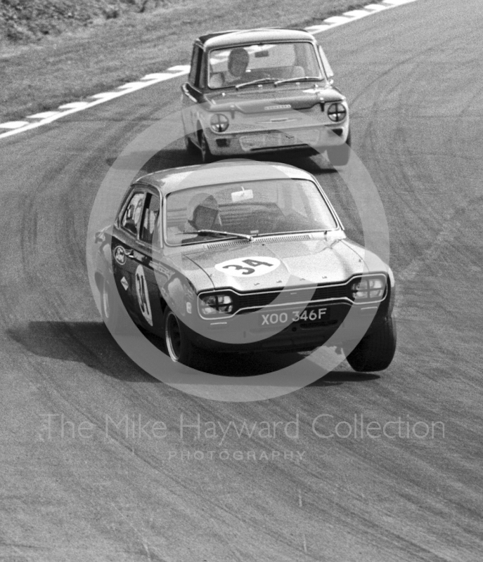 Roger Clark, Alan Mann Ford Escort TC, reg no XOO 346F, leads Tony Lanfranchi, Alan Fraser Hillman Imp, through Bottom Bend, British Saloon Car Championship race, 1968 Grand Prix meeting, Brands Hatch.
