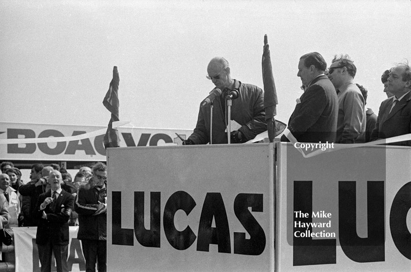 Earl Howe, BARC president, cuts the tape and officially opens the Thruxton circuit before the 1968 Formula 2 International, Easter Monday meeting.
