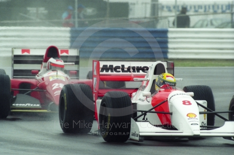 Ayrton Senna, McLaren MP4-8, followed by Gerhard Berger, Ferrari F93A,&nbsp;seen during wet qualifying at Silverstone for the 1993 British Grand Prix.
