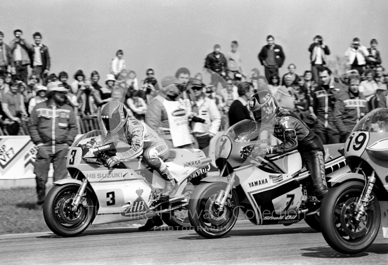  Randy Mamola, 500cc Suzuki, and Barry Sheene, 500cc Yamaha, leave the grid at the John Player International Meeting, Donington Park, 1982.
