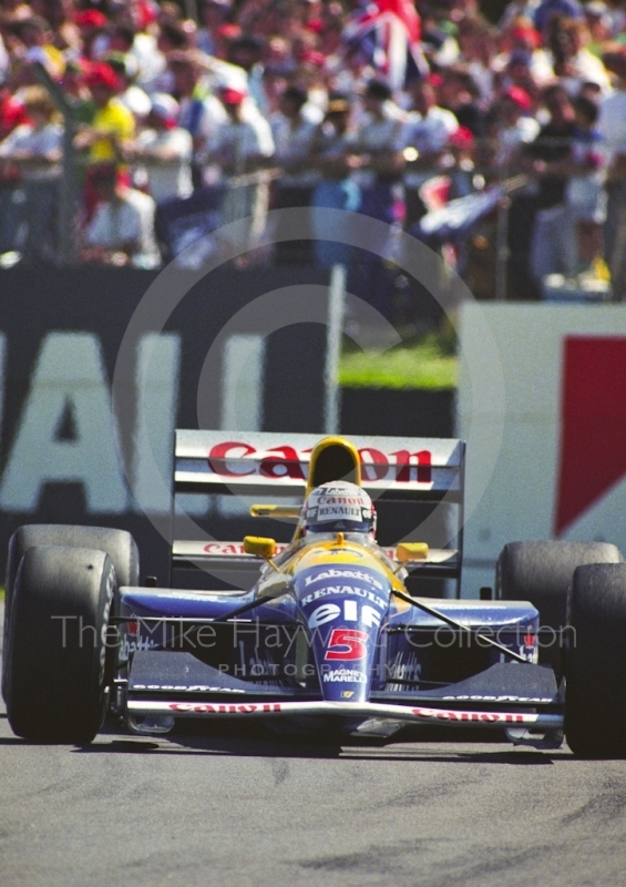 Winner Nigel Mansell, Williams FW14, British Grand Prix, Silverstone, 1991.
