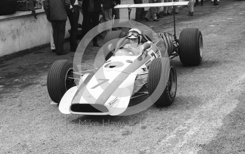 John Surtees leaves the pits in his Honda V12 RA301 during practice for the 1968 British Grand Prix at Brands Hatch.
