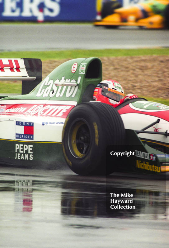 Johnny Herbert, Lotus 107B, seen during wet qualifying at Silverstone for the 1993 British Grand Prix.
