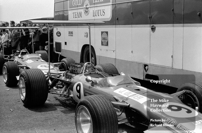 Jackie Oliver and Graham Hill's Lotus 49Bs in the paddock at Brands Hatch, 1968 British Grand Prix.<br />
<br />
<em>Picture by Richard Rhodes</em>
