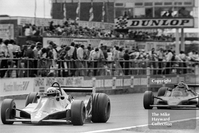 Didier Pironi, Tyrrell 009, leads Jacky Ickx, Ligier JS11, 1979 British Grand Prix, Silverstone.
