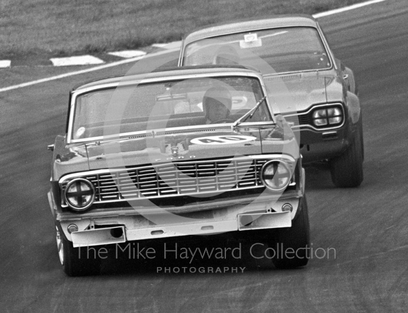 Hubert Hahne, Malcolm Gartlan Ford Falcon Sprint, leads Frank Gardner, Alan Mann Ford Escort TC, through South Bank Bend, British Saloon Car Championship race, 1968 Grand Prix meeting, Brands Hatch.

