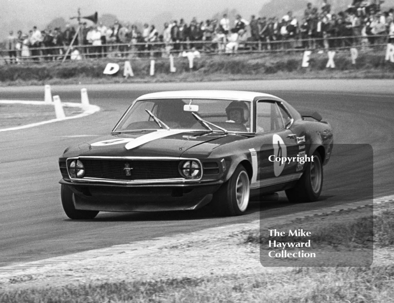 Frank Gardner, Motor Racing Research Ford Mustang Boss, at Copse Corner, Silverstone Martini Trophy meeting 1970.
