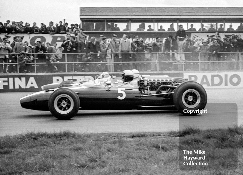 Richie Ginther, Cooper T81, Jo Bonnier, Cooper T81, Denny Hulme, Brabham BT11, at the start of the 1966 International Trophy, Silverstone.
